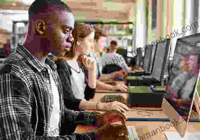 A Group Of Students Working On A Computer In A Library. Education Finance In The New Millenium (Spirits Of The Ancient Sands)